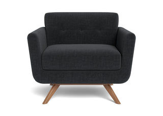 The jewel green fabric Cooper Chair is a hip, modern arm chair with a vintage mid-century look.