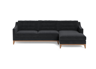 Refined traditional mid-century design is reflected in the Lawson Sofa Chaise, pictured here in bourbon