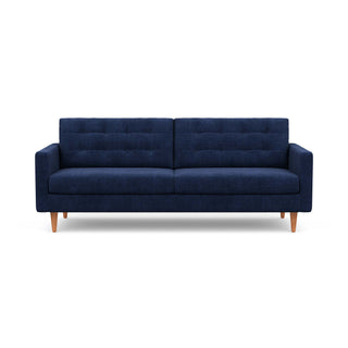 The mid-century modern Quinn Sofa in blue