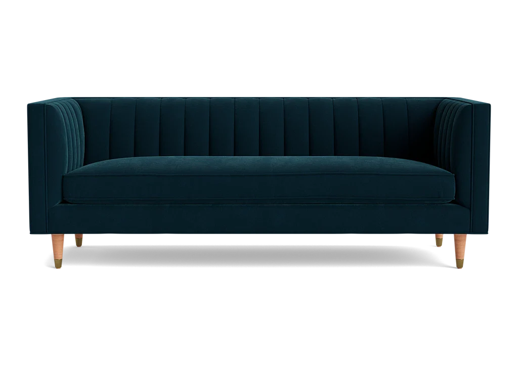 Shelter arm Belmont sofa with gold velvet and cone legs