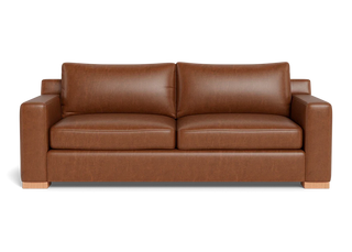  Burnside sofa in caramel leather with deep seat, wide track arms and block legs in walnut. 