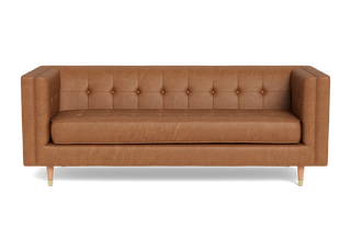 Shelter arm tight back Gramercy sofa with button tufted back and button tufted seat, cone legs and upholstered in millennial pink fabric.