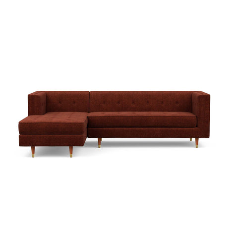 The Gramercy sofa chaise sectional, in burgundy, is a modern couch with a vintage feel