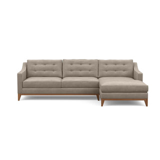 Refined traditional mid-century design is reflected in the Lawson Sofa Chaise, pictured here in taupe