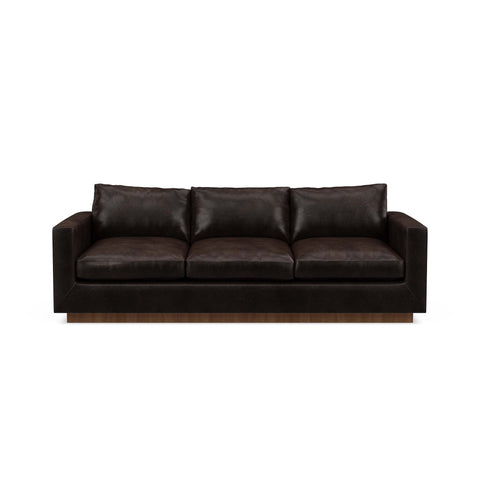 The Lowe Sofa in dark leather reflects minimalistic home design