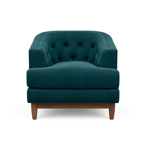 The Taylor Arm Chair in jewel green is Hollywood Regency furniture at its best.
