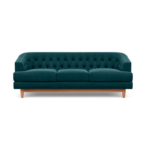 The Taylor Sofa in jade green is Hollywood Regency furniture at its best.